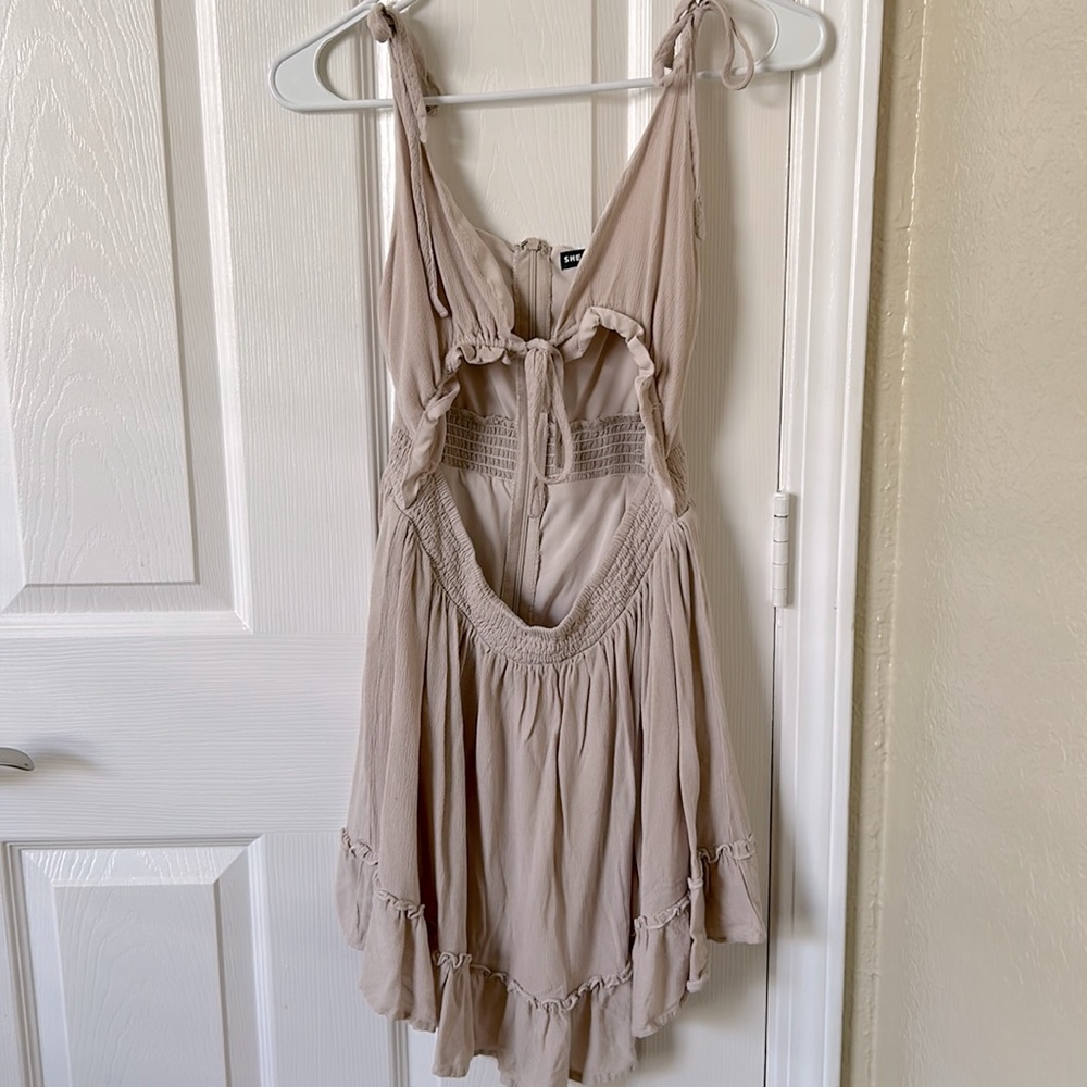 SHEIN, adjustable straps and boob area, cut out in front, never worn, size small